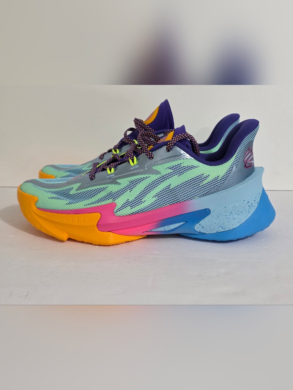 Under Armour Purple Athletic Shoes with Yellow Accents